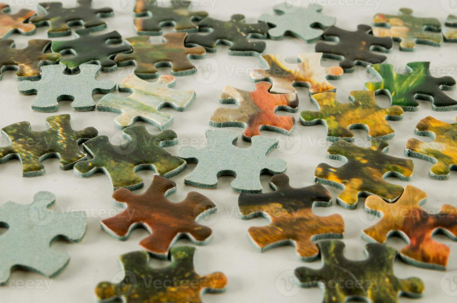 Puzzle pieces on the table photo