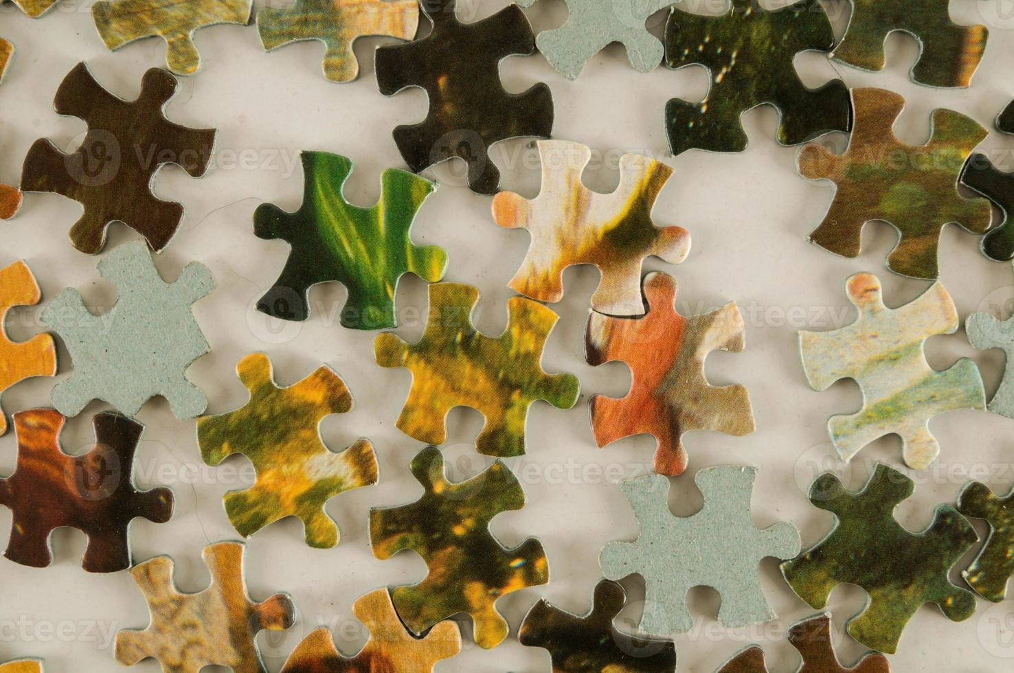 Puzzle pieces on the table photo