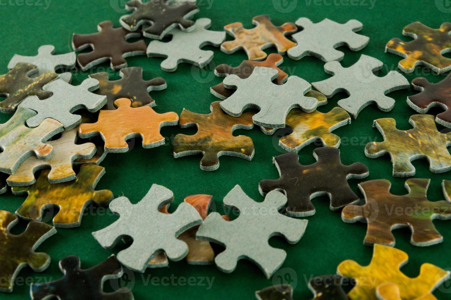 Puzzle pieces on the table photo