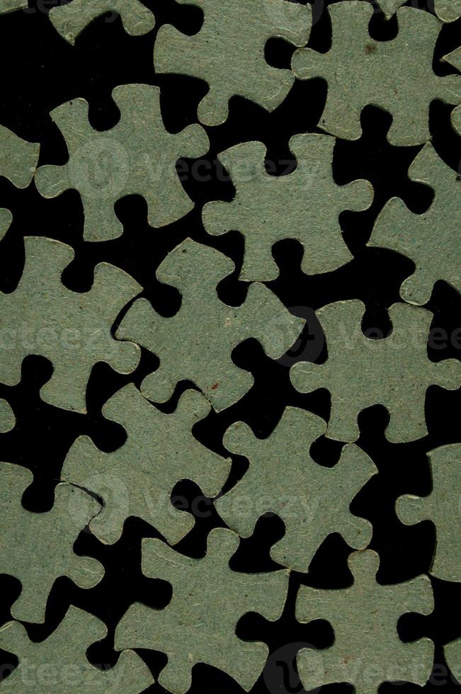 Puzzle pieces on the table photo