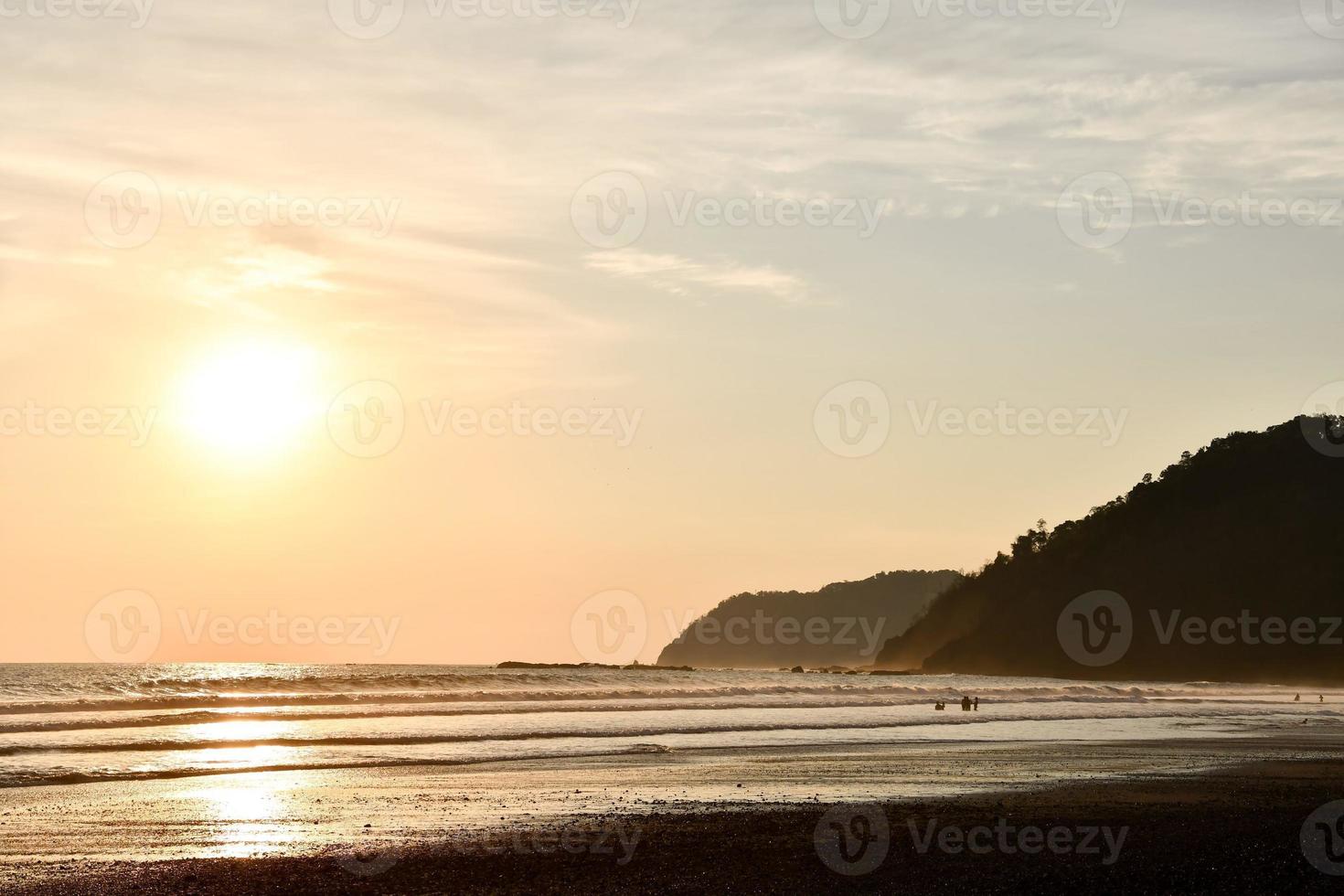 Sunset over the ocean photo