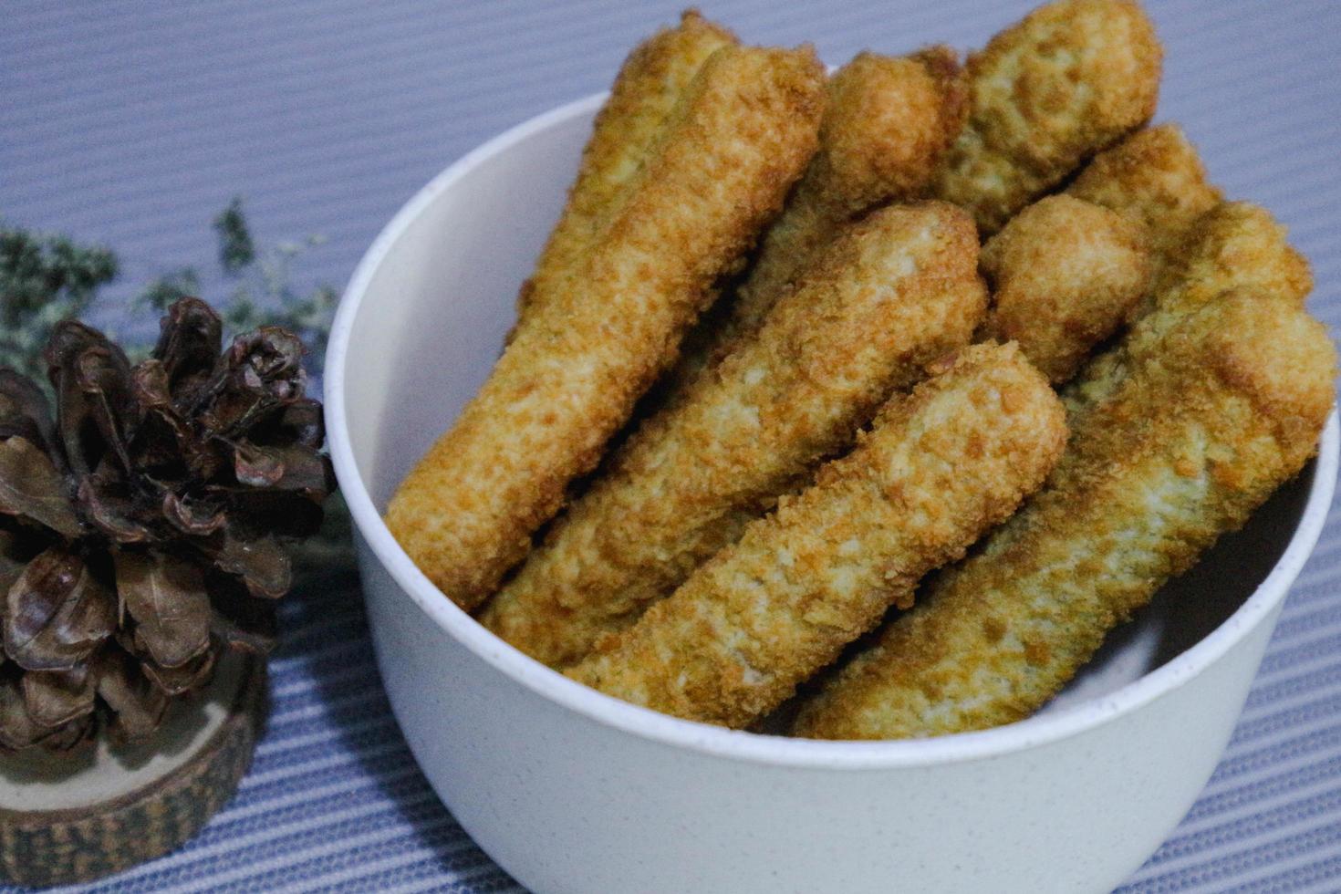 Chicken finger nuggets or chicken nuggets in the form of sticks photo