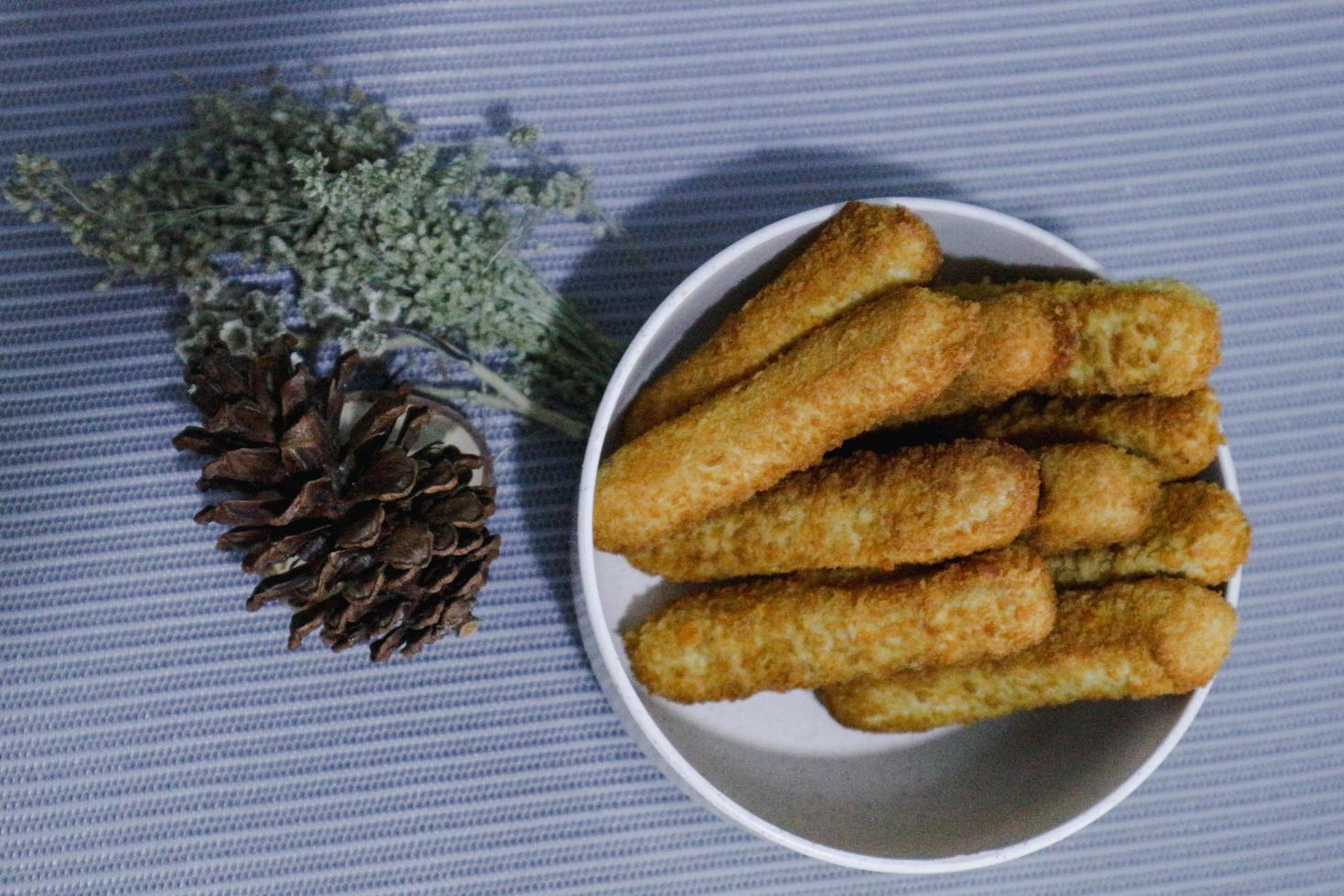 Chicken finger nuggets or chicken nuggets in the form of sticks photo