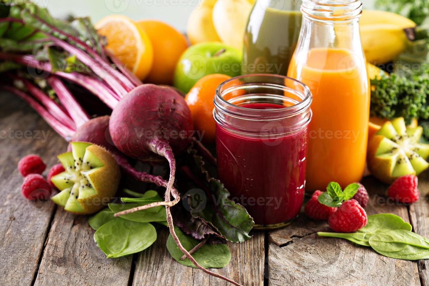 Variety of fresh vegetable and fruit juices photo