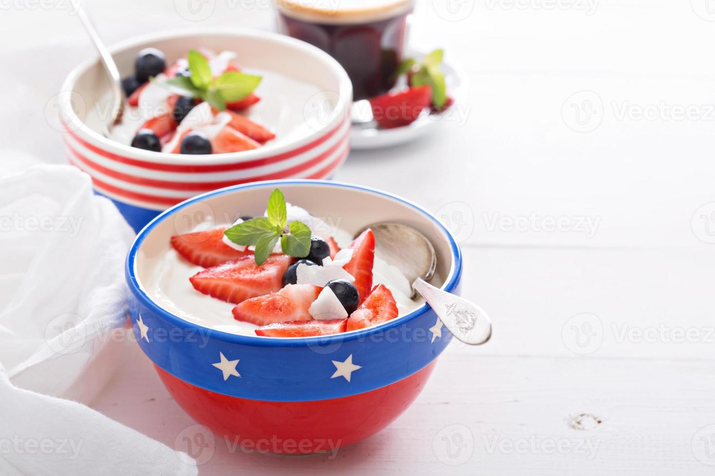 Yogurt bowls with strawberry and blueberry photo