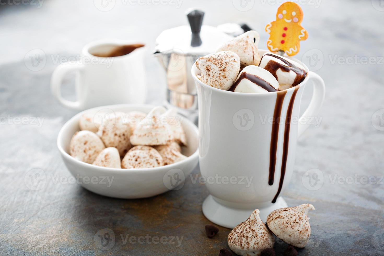 Hot chocolate with marshmallows and little meringues photo