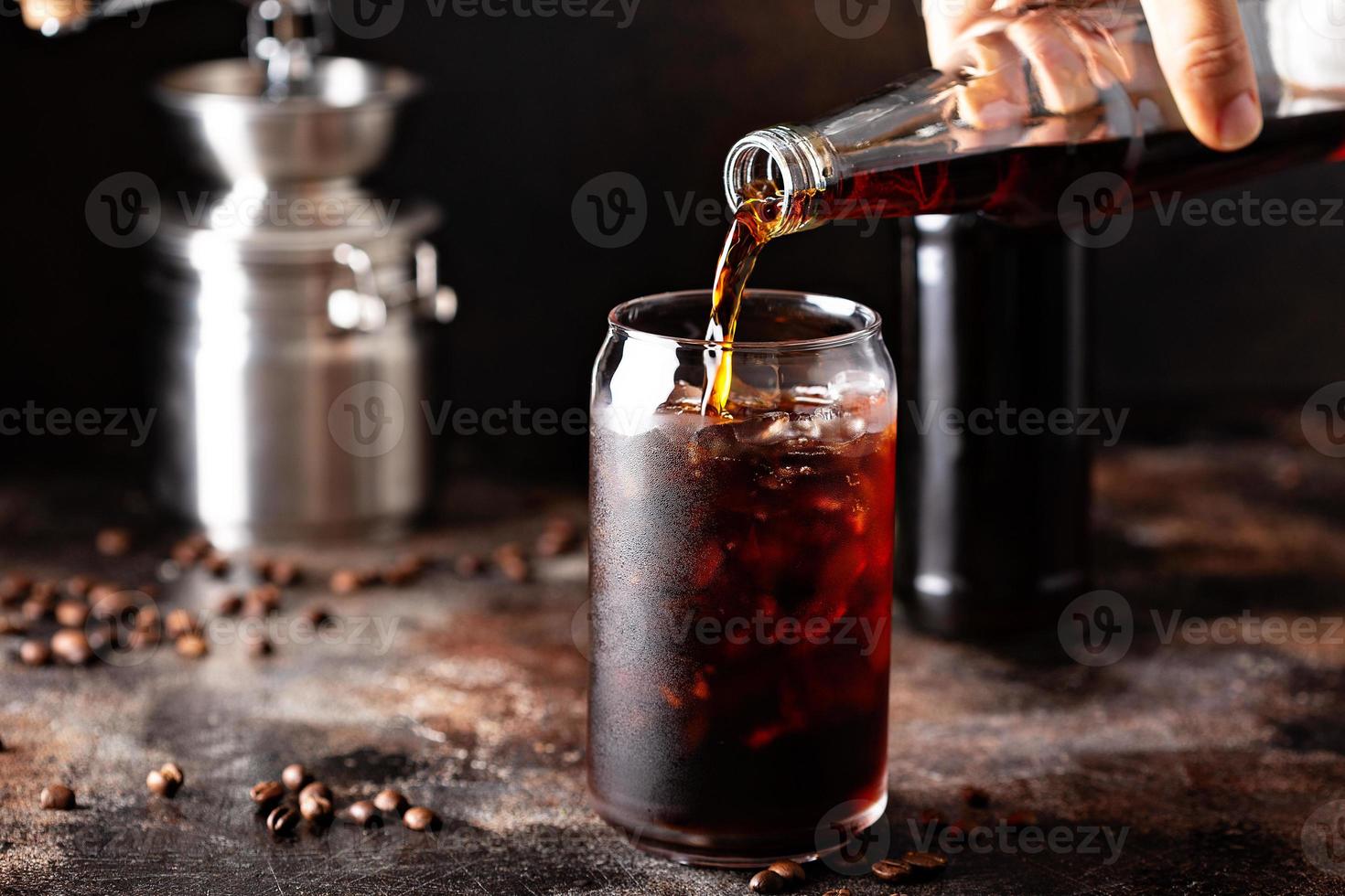 Cold brew iced coffee in glass bottles photo