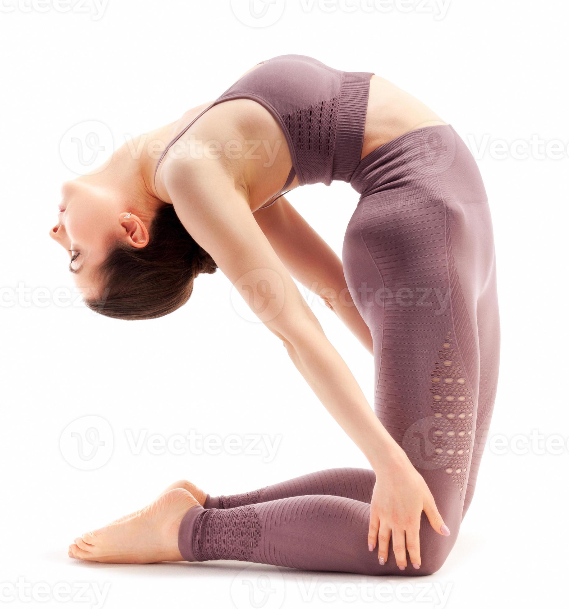 Sporty young woman doing yoga practice isolated on white