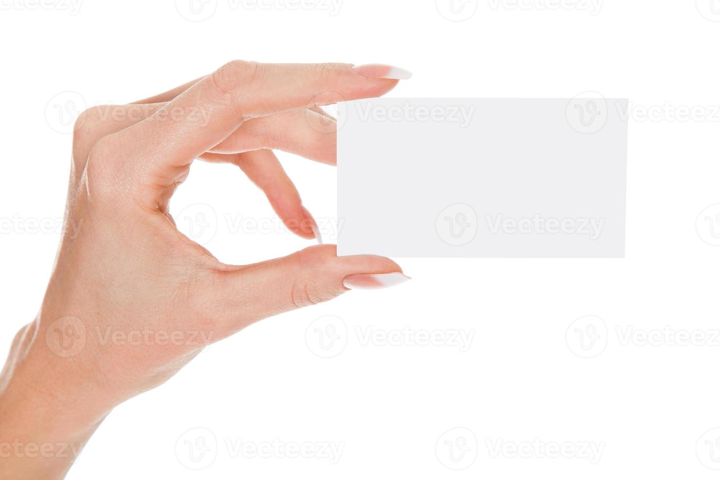 Female hand with an empty white card photo