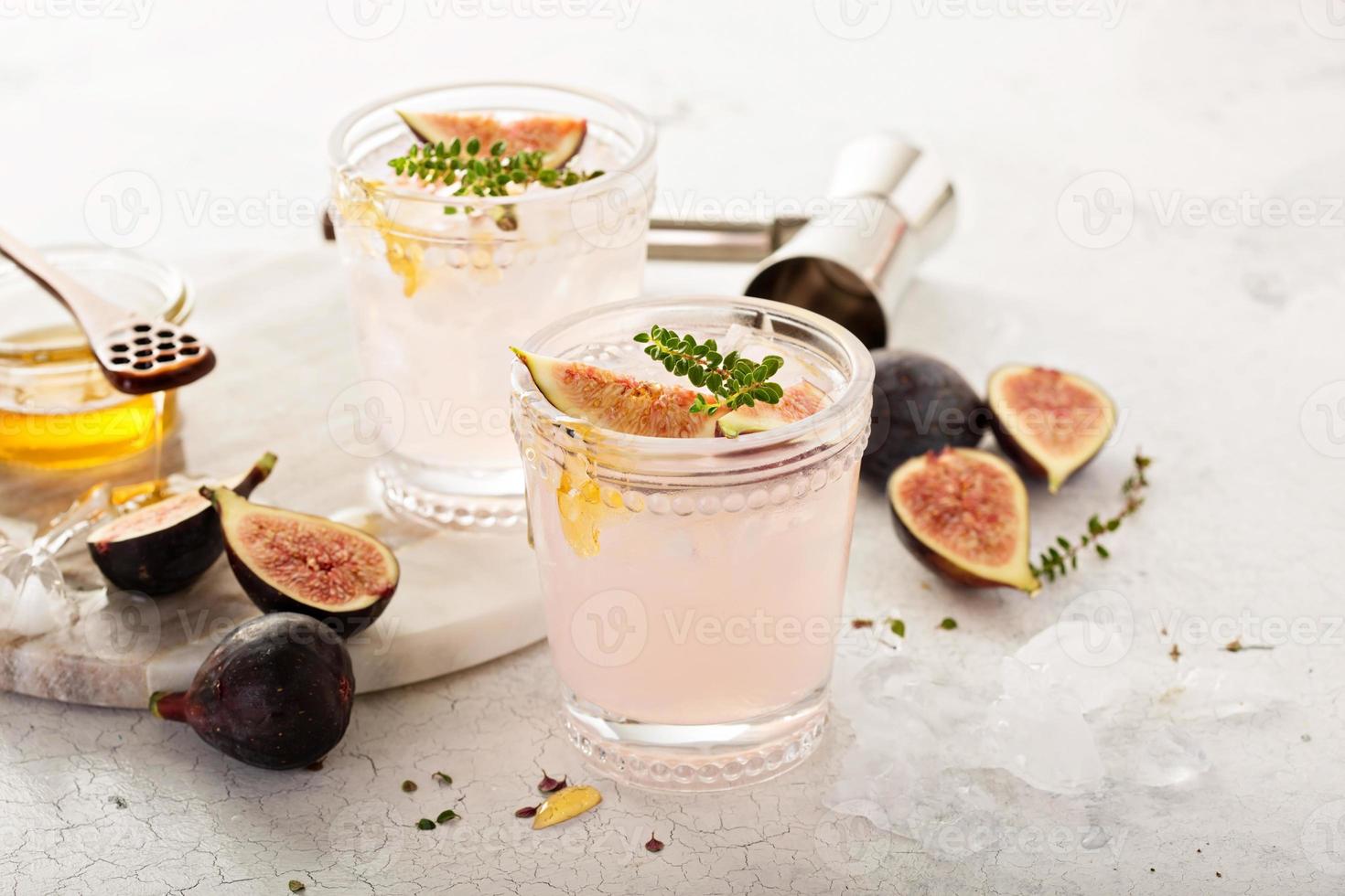 Pink fig cocktail with honey and thyme photo