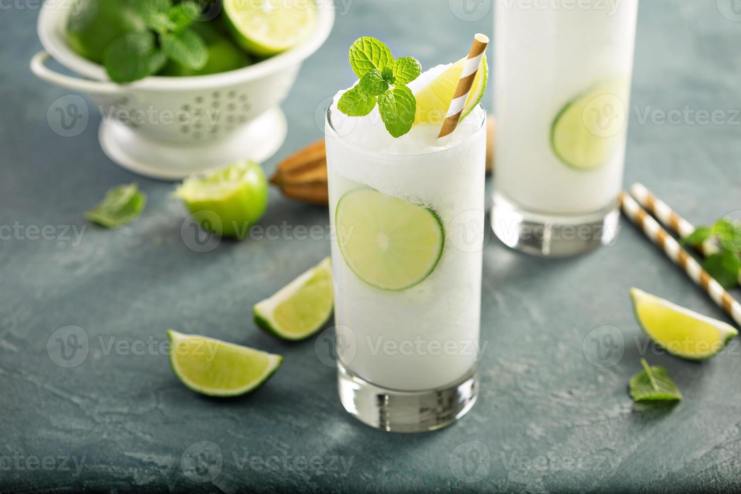 Refreshing lime frozen cooler or slushie photo