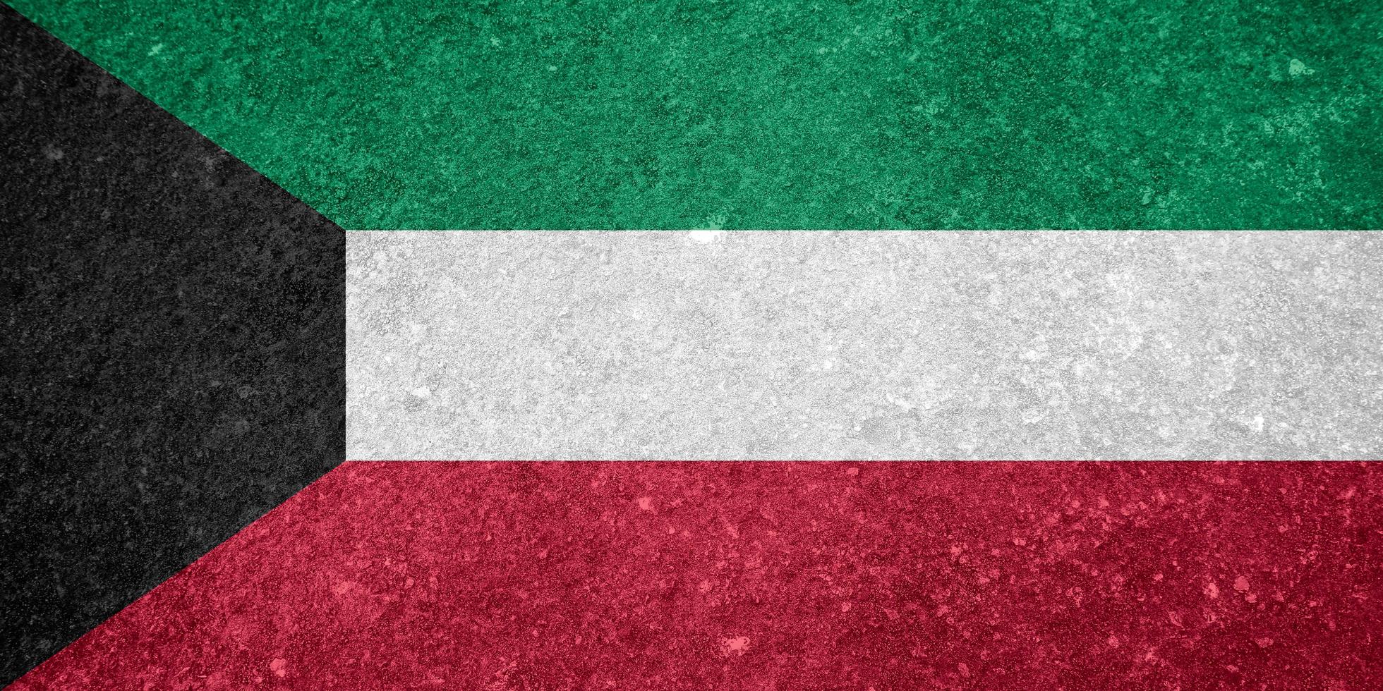 textura de la bandera de kuwait como fondo foto