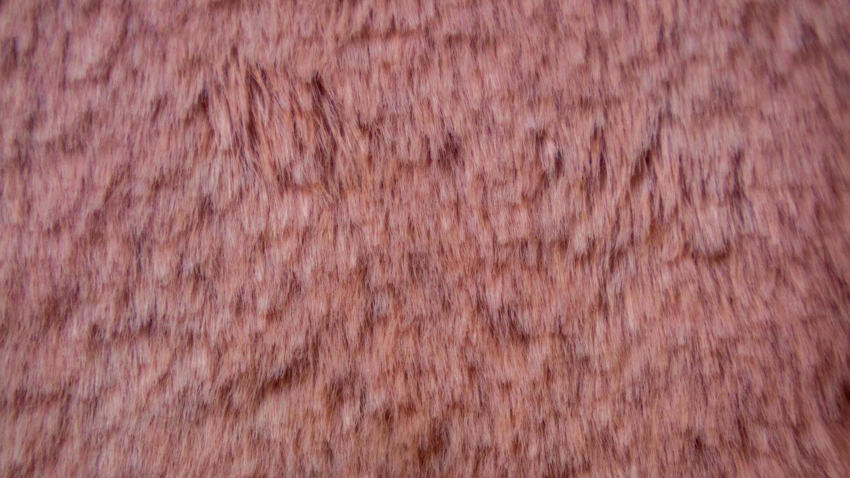 textura de lana rosa como fondo foto