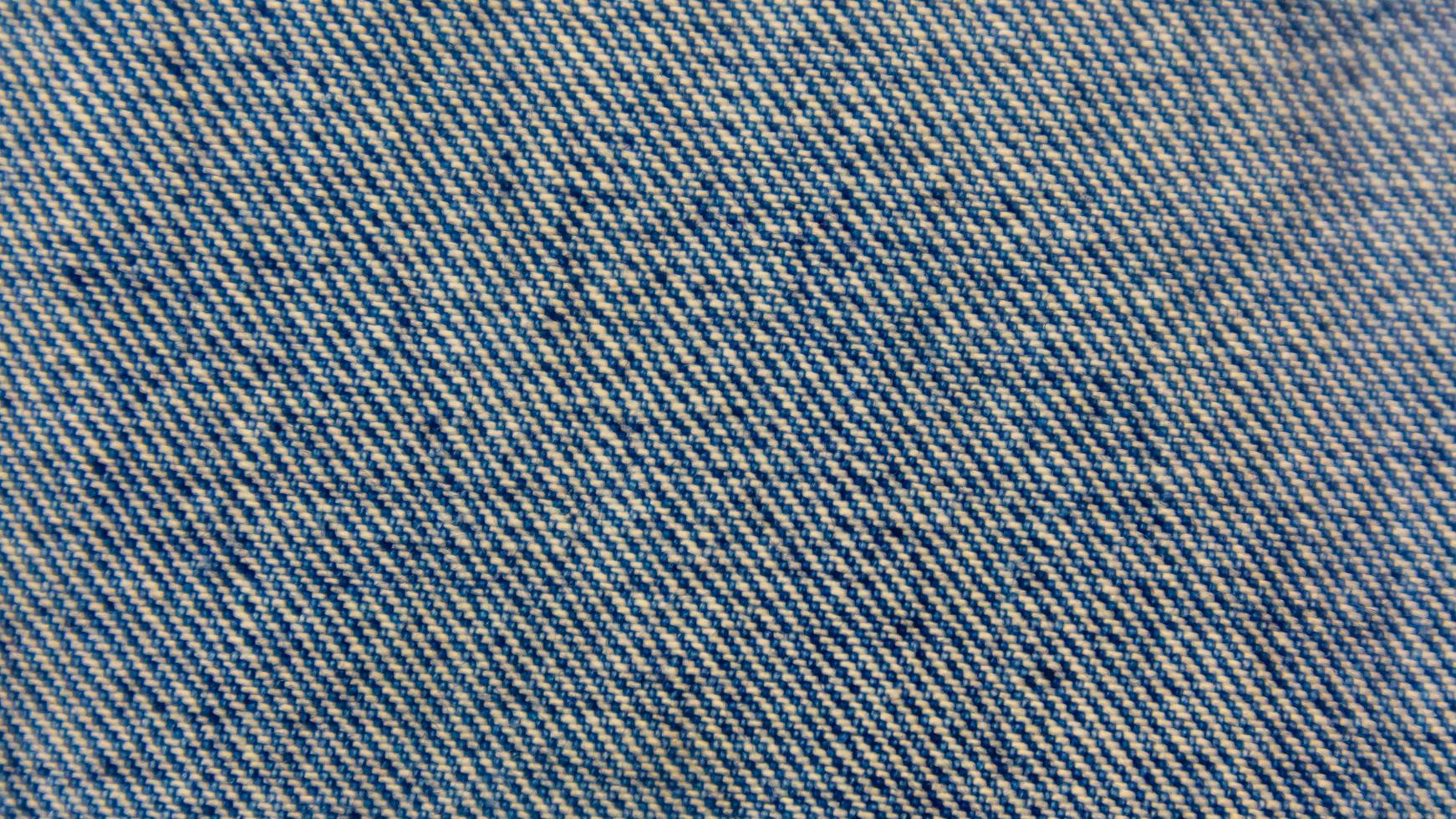 Blue jeans texture as a background photo