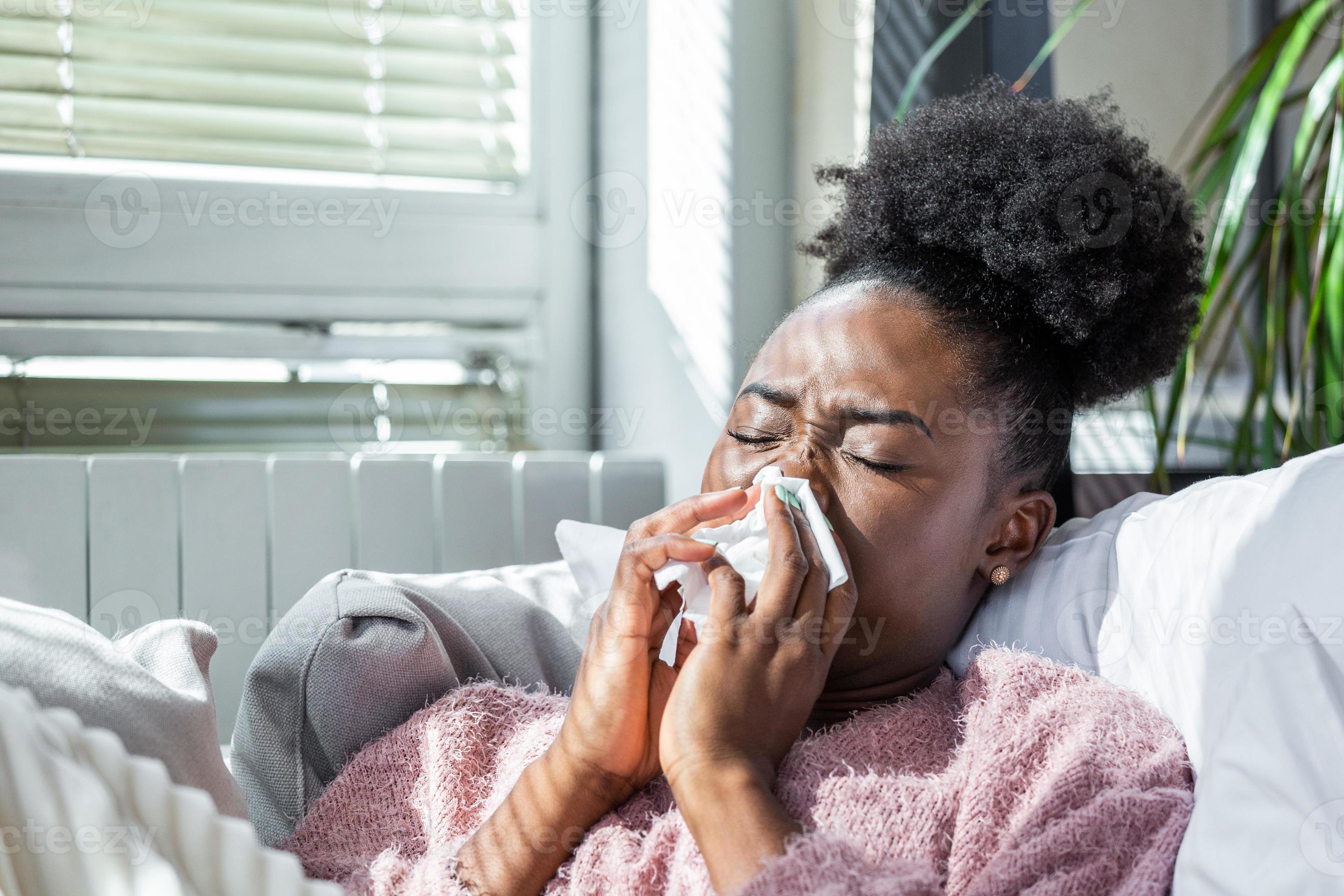 Sick Woman.Flu.Woman Caught Cold. Sneezing into Tissue. Headache. Virus