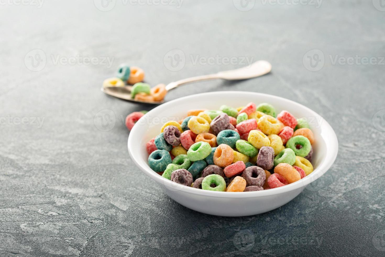 Fruit colorful sweet cereals in a bowl photo