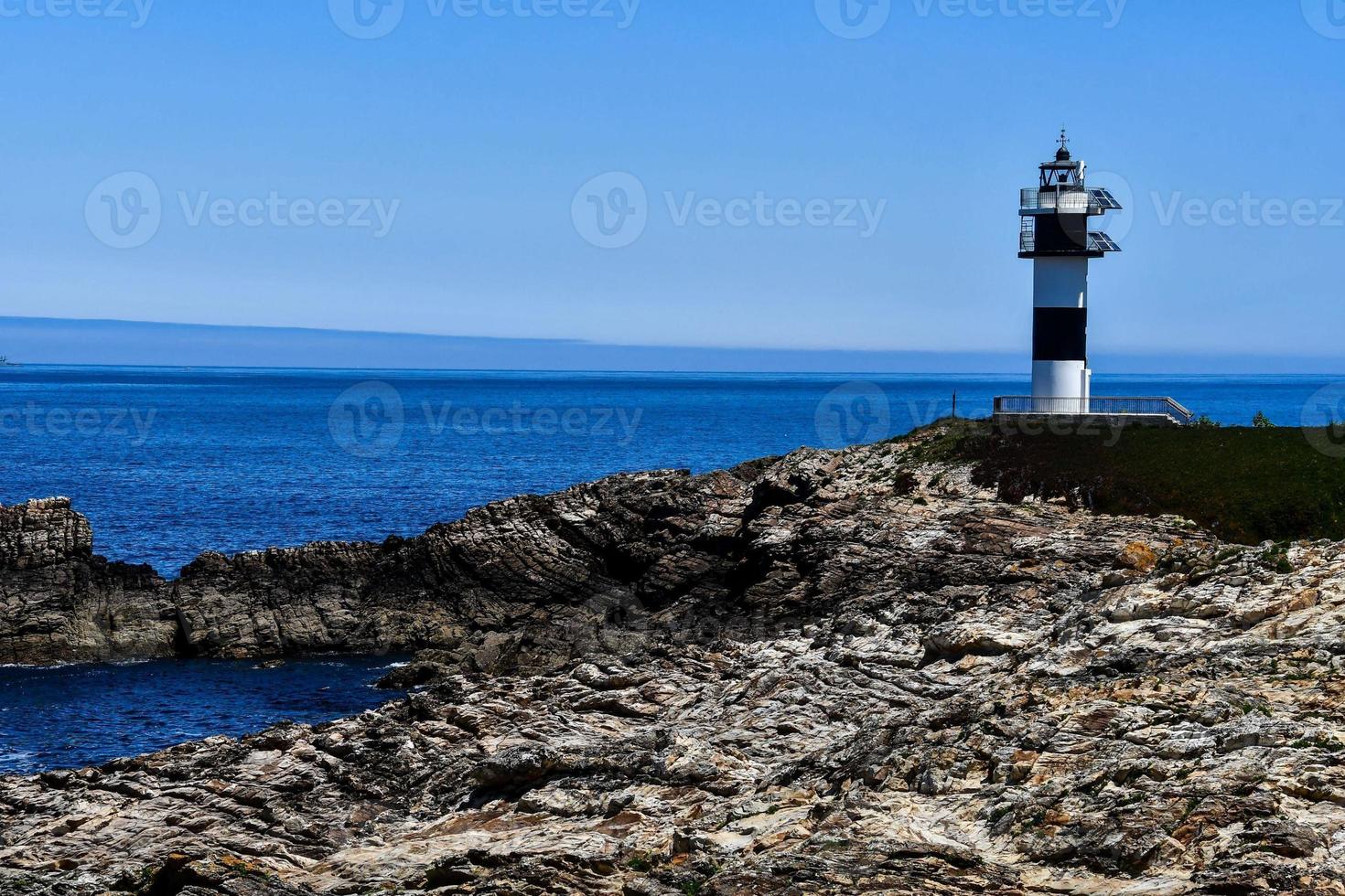 faro junto al mar foto