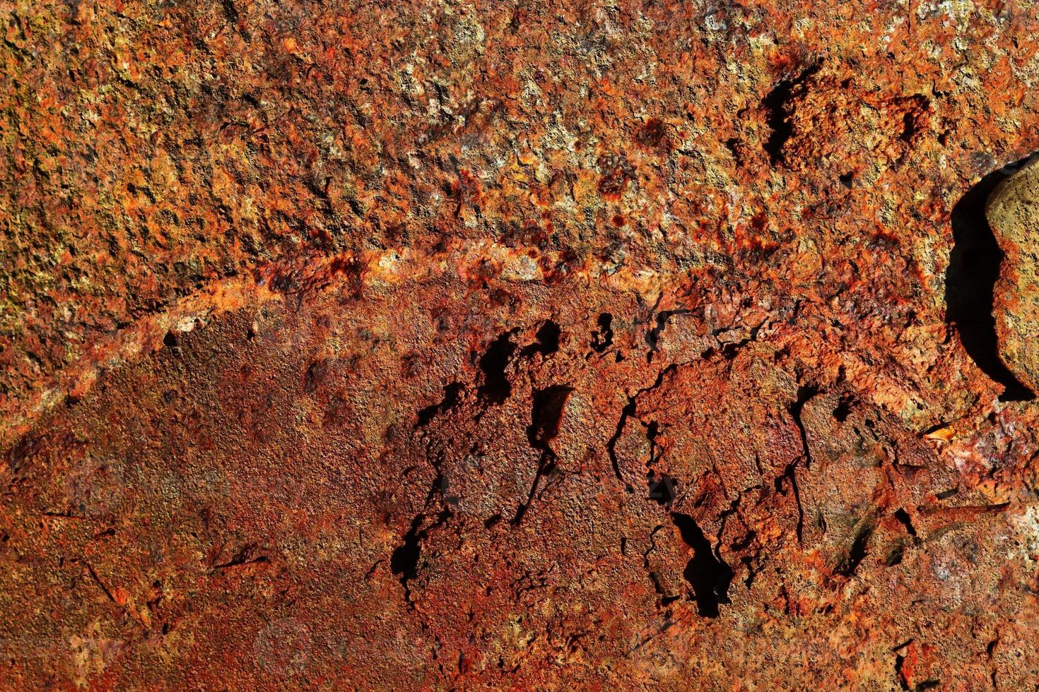 Detailed close up surface of rusty metal and steel with lots of corrosion in high resolution photo