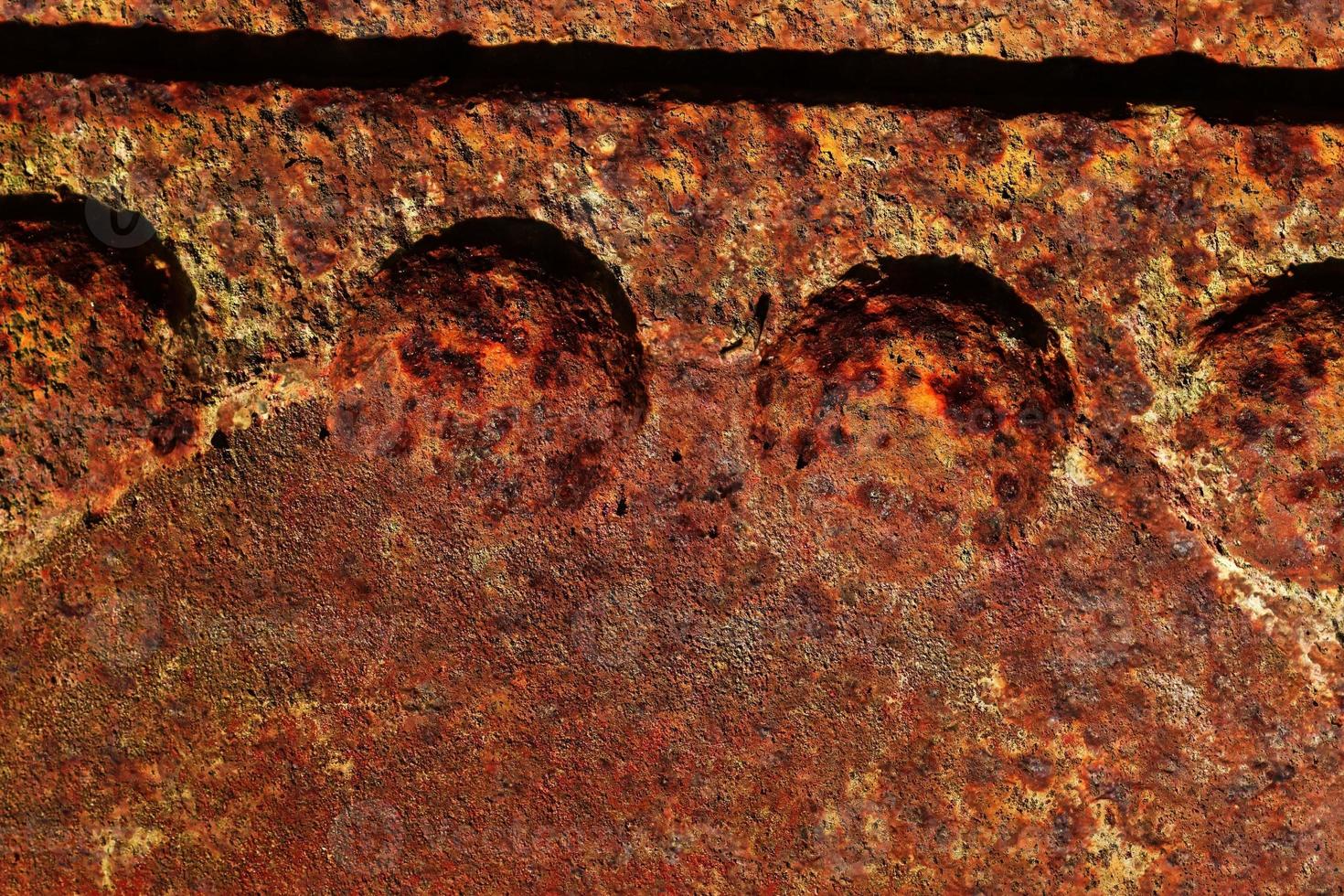 Detailed close up surface of rusty metal and steel with lots of corrosion in high resolution photo