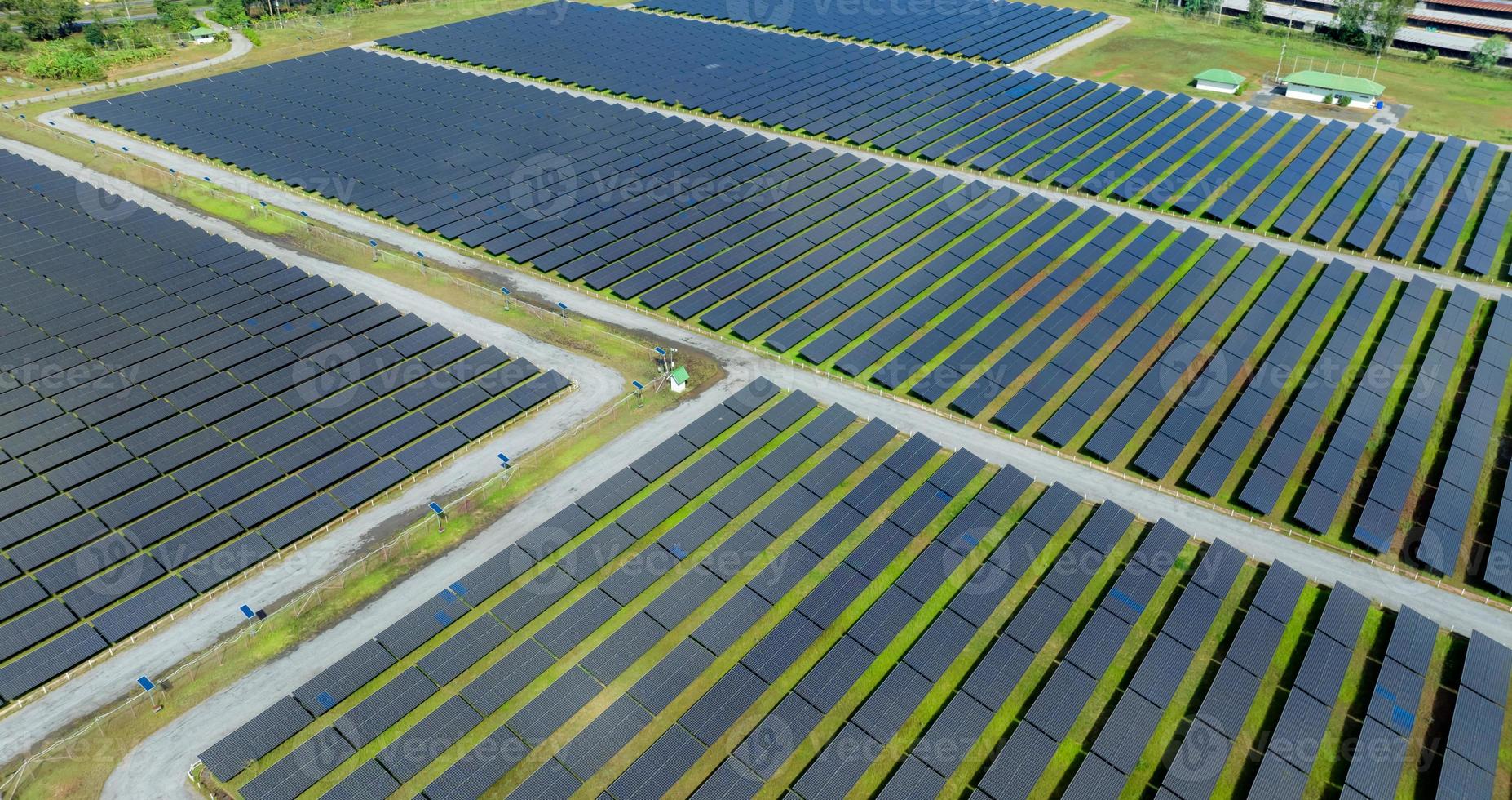 Aerial view of solar farm. Solar power for green energy. Sustainable resources. Solar cell panels use sun light as a source to generate electricity. Photovoltaics or PV. Sustainable renewable energy. photo