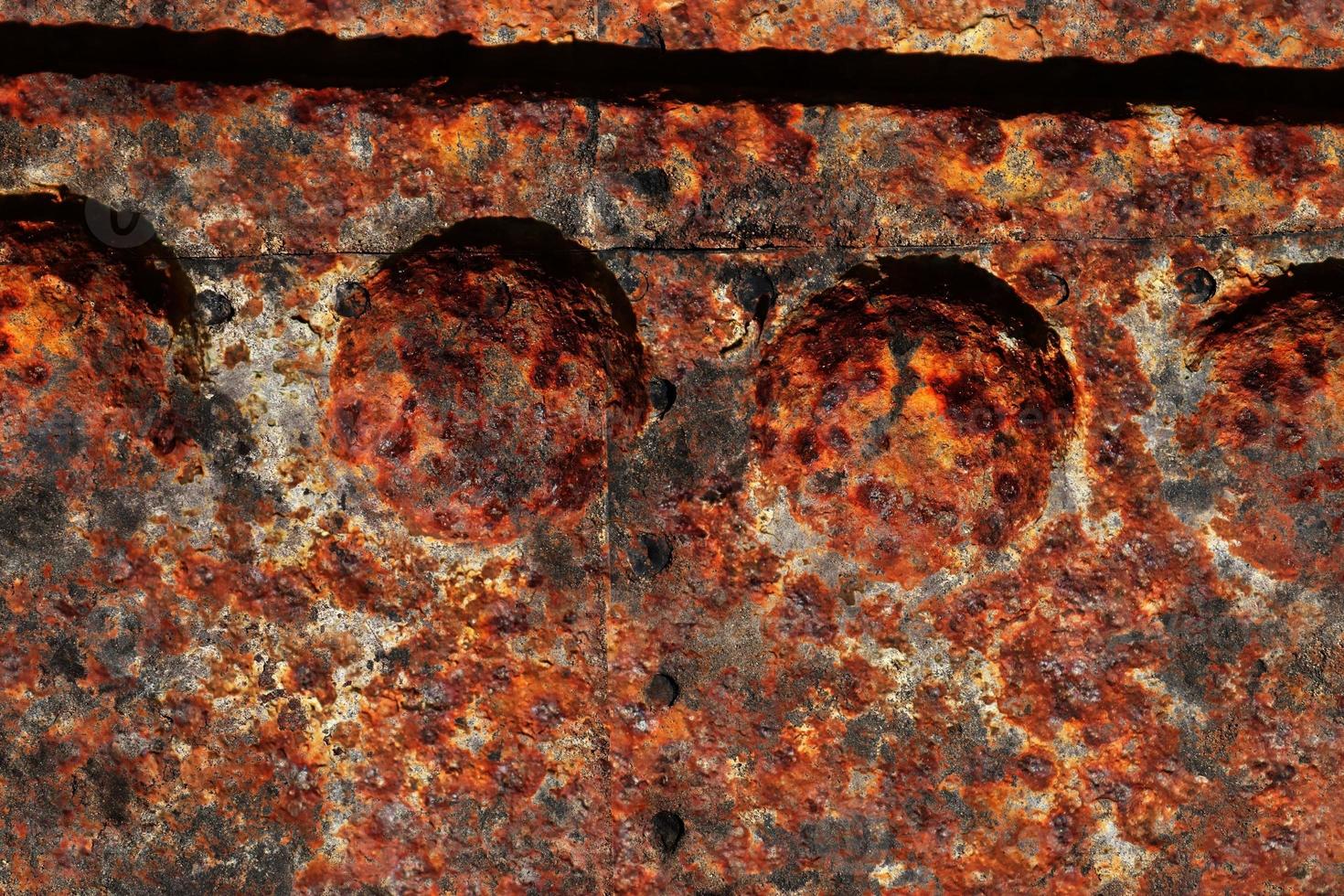 Detailed close up surface of rusty metal and steel with lots of corrosion in high resolution photo