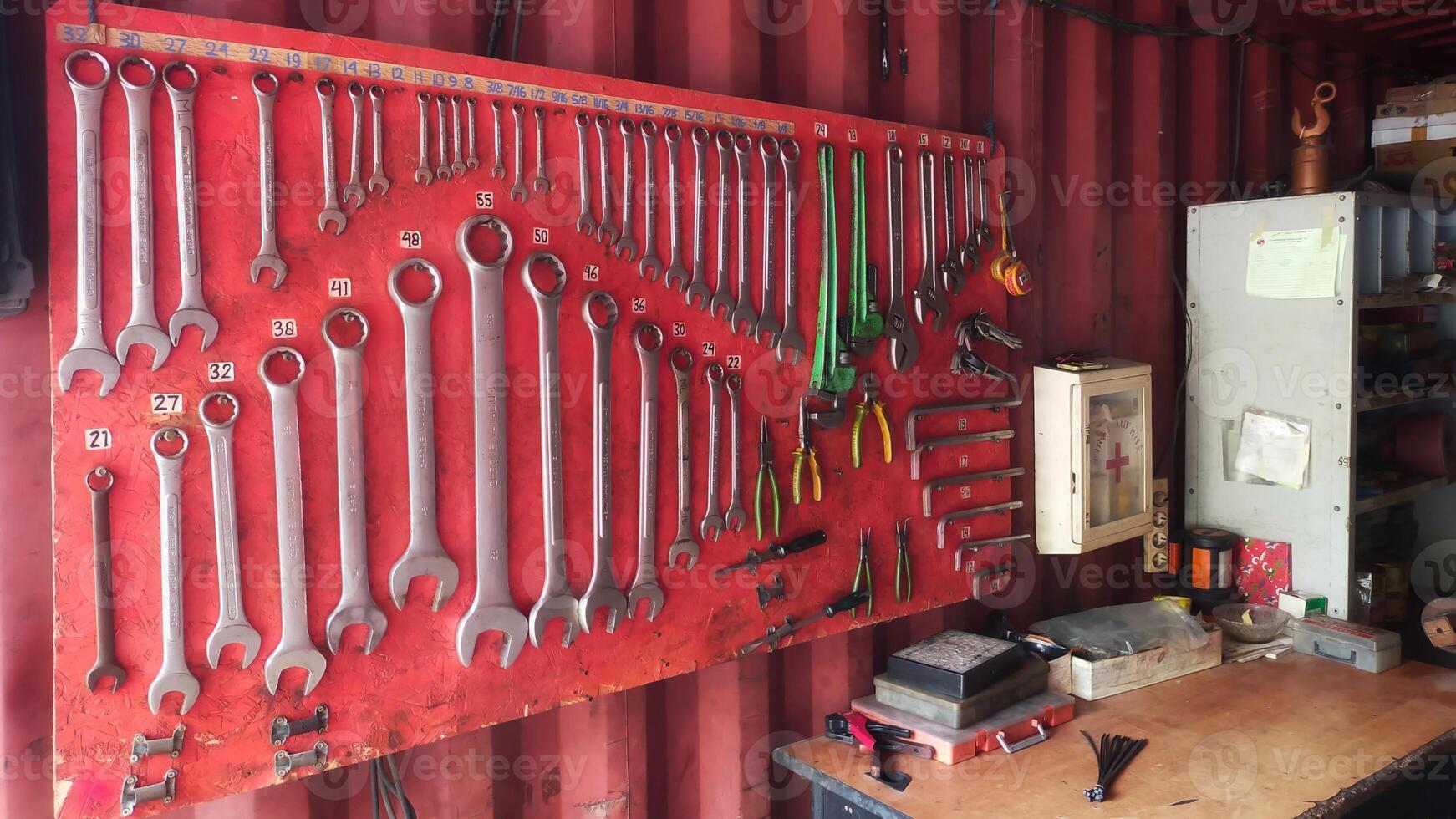 Complete hanging workshop tool kit board, workbench in container. photo