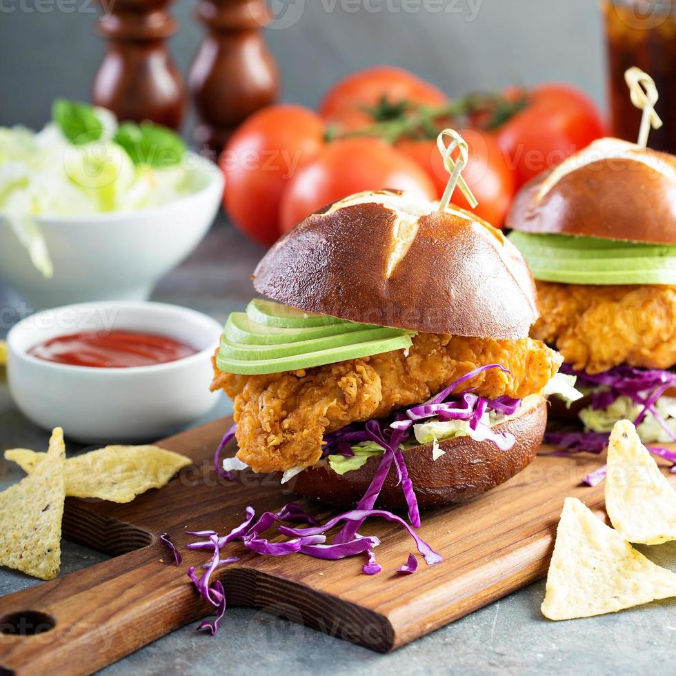 Chicken tender sandwich with avocado and slaw photo