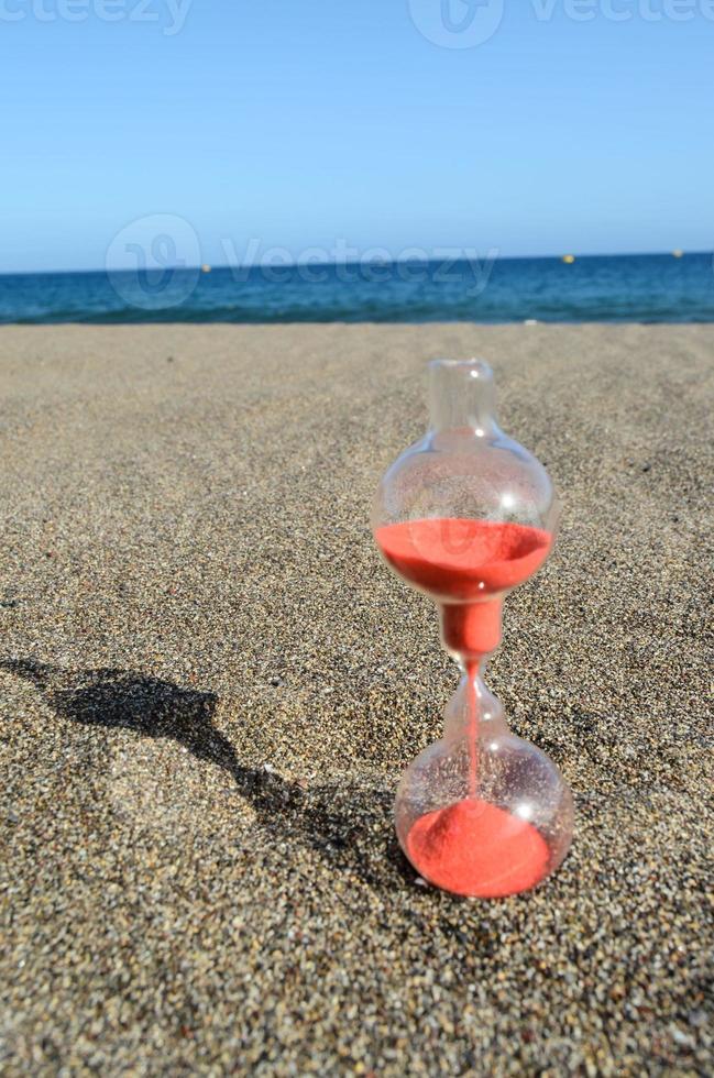 Hourglass on a Beach photo