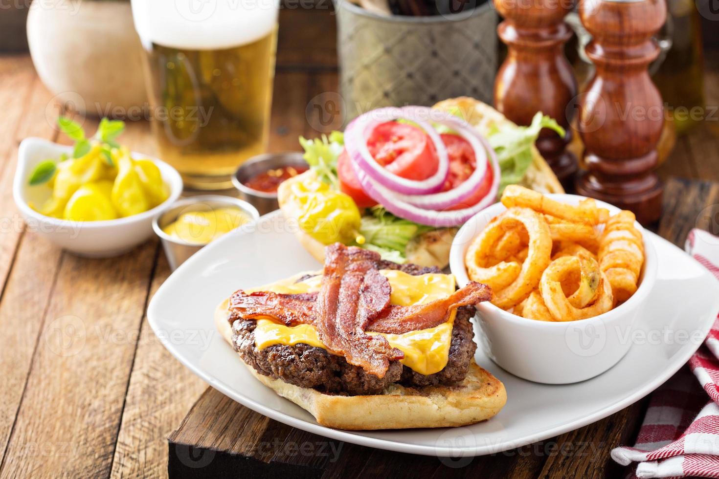 Traditional american burger with cheese and bacon photo