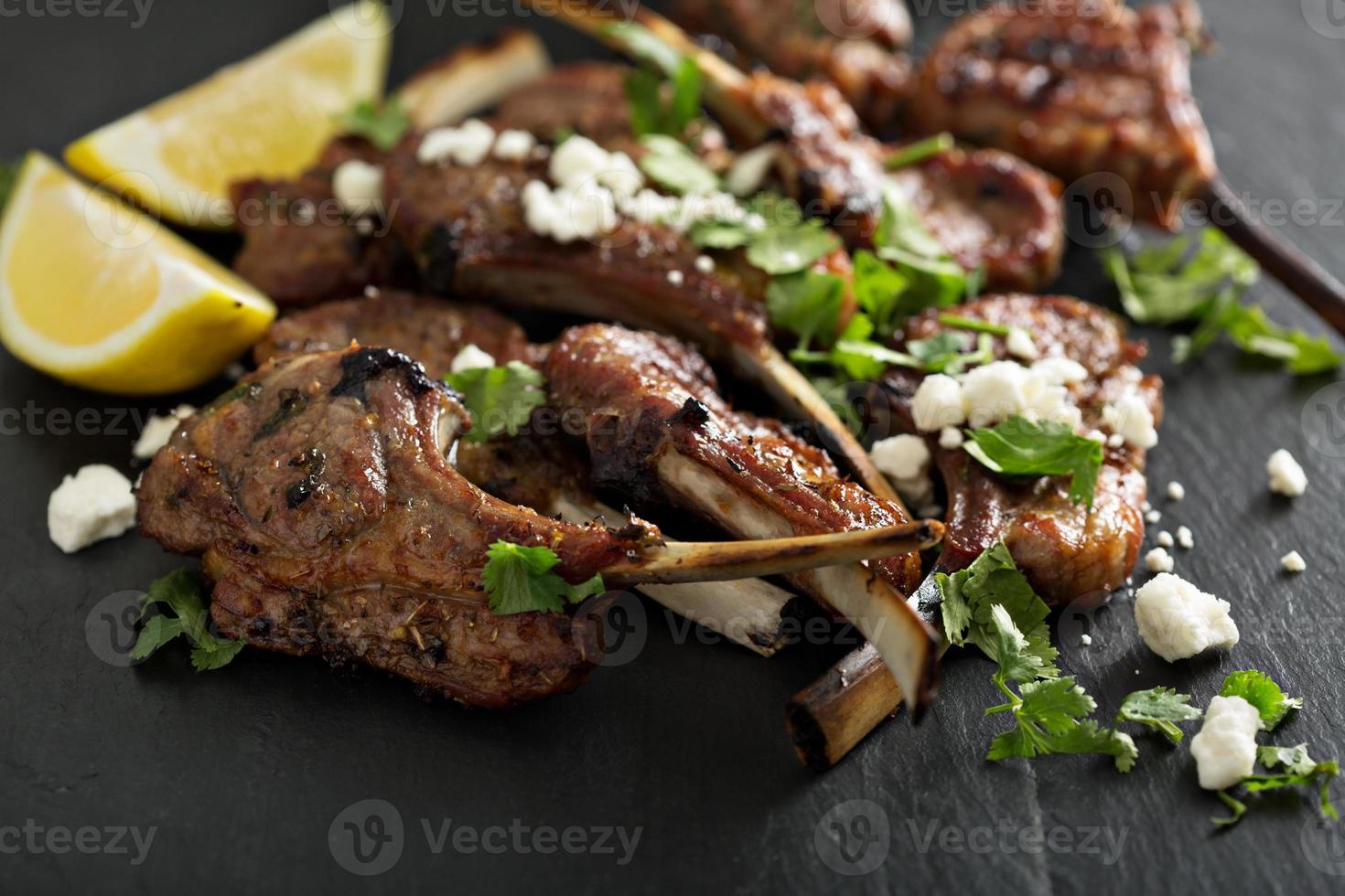 Lamb chops with herbs and feta photo