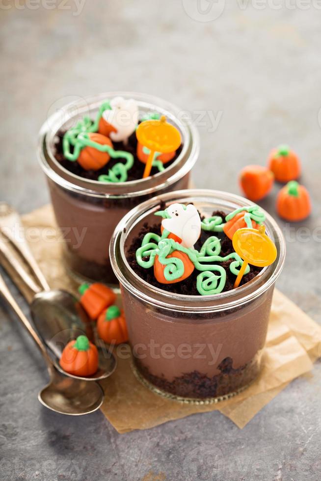 Halloween dessert in a jar, chocolate pudding photo