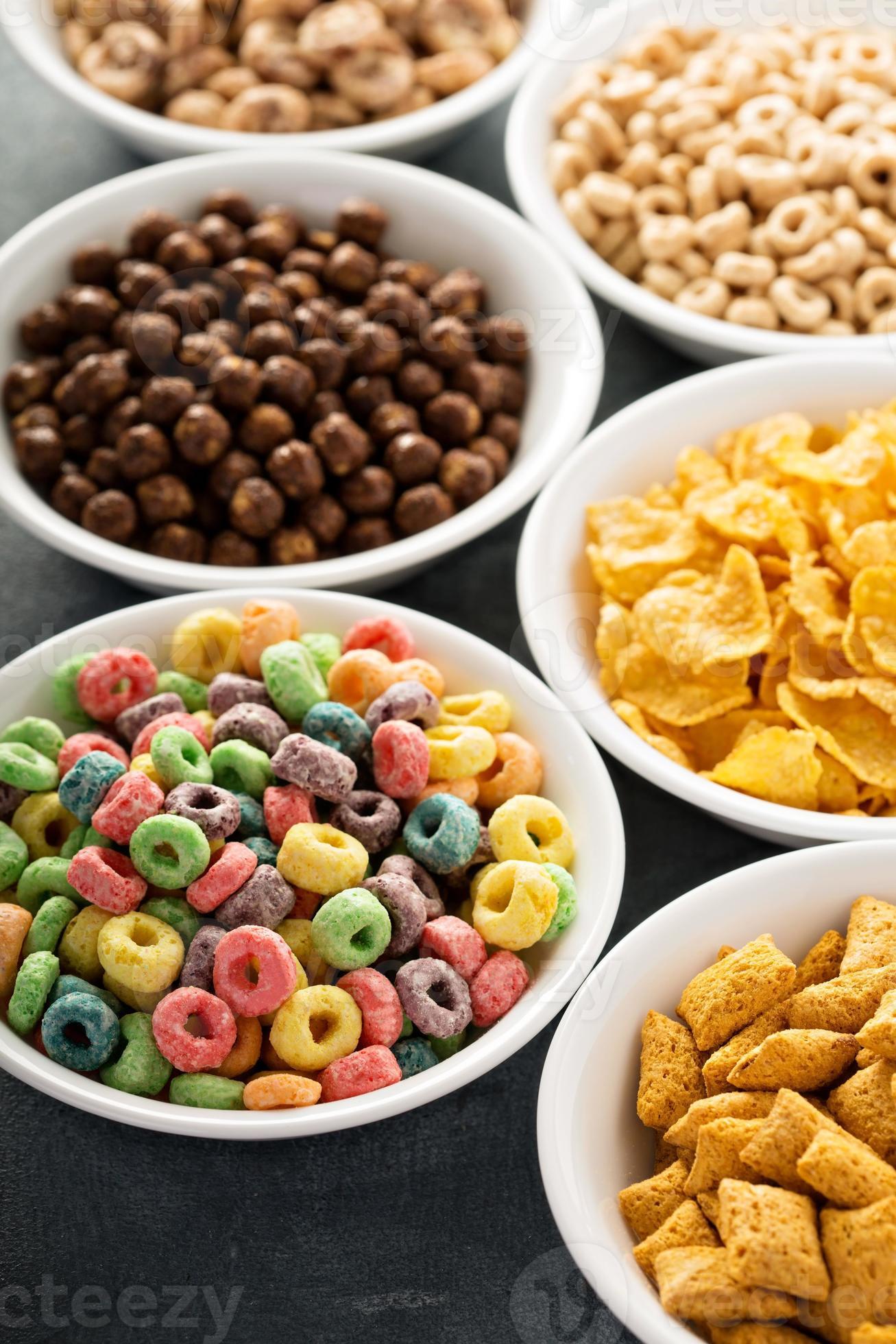 Variety of cold cereals in white bowls 15750410 Stock Photo at Vecteezy