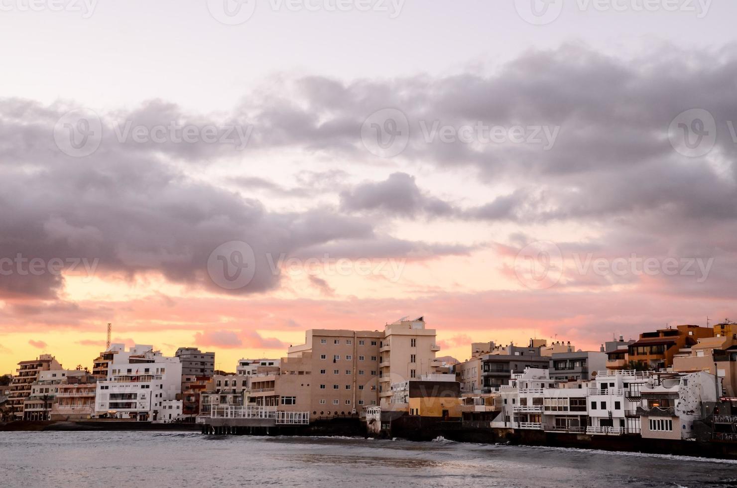 Sunset over the ocean photo