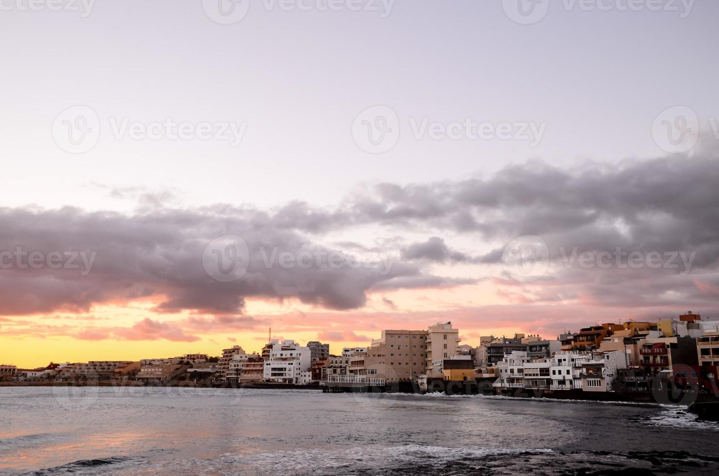 Sunset over the ocean photo