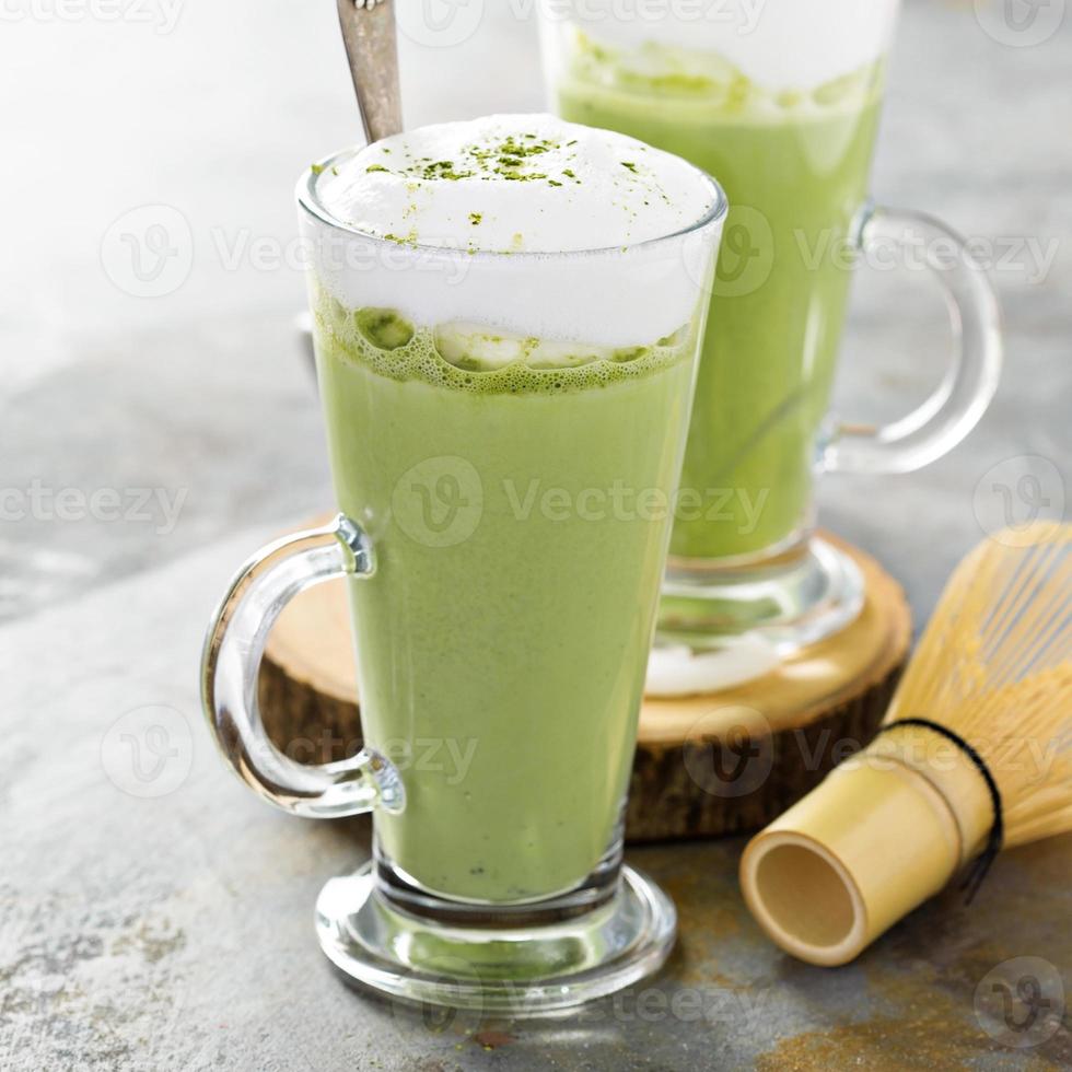 Matcha latte in tall glasses photo