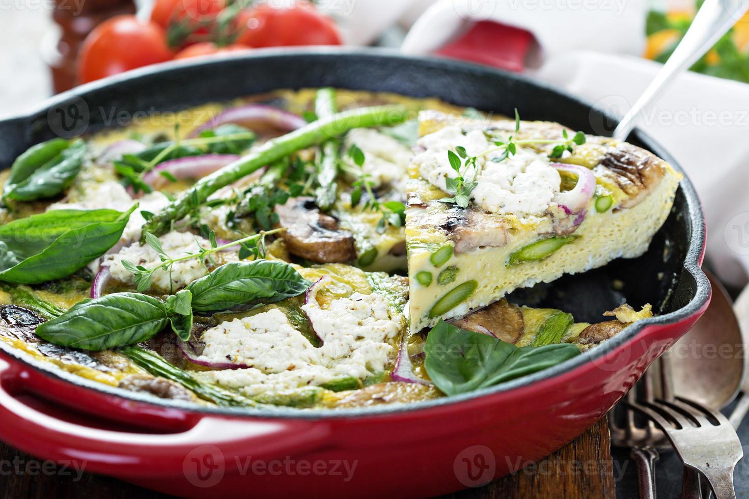 Asparagus, mushrooms and goat cheese frittata photo