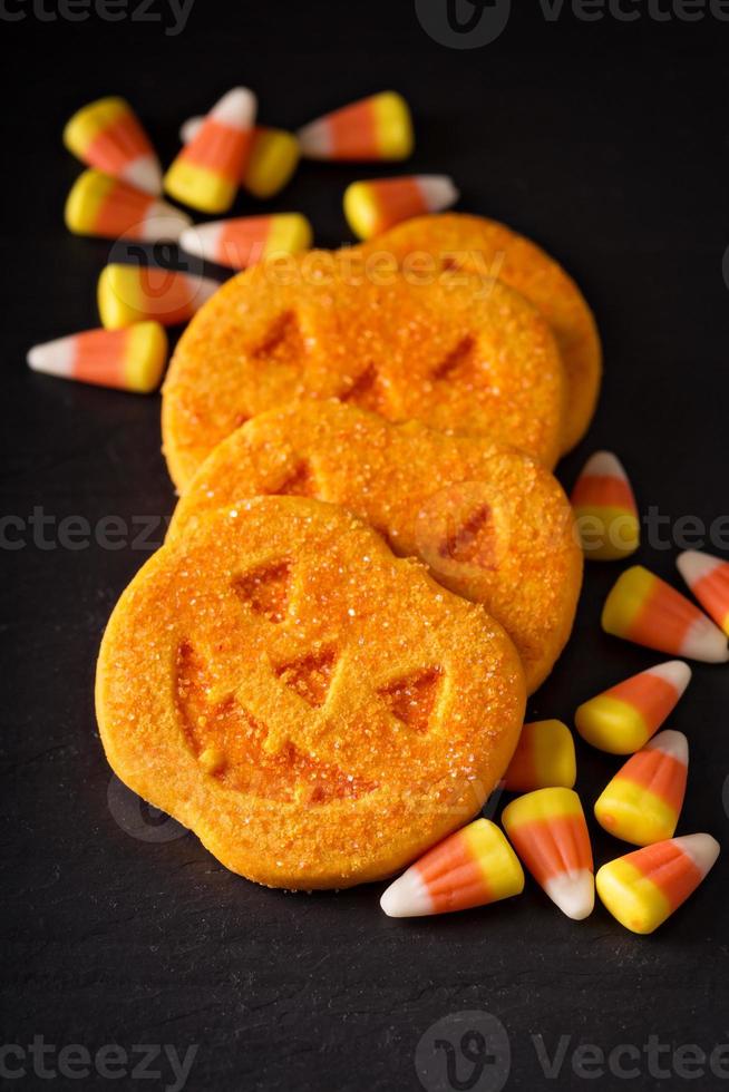 galletas y dulces de calabaza de halloween foto