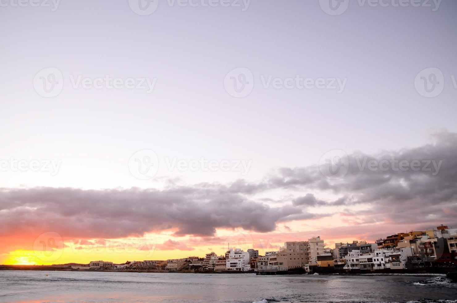 Sunset over the ocean photo