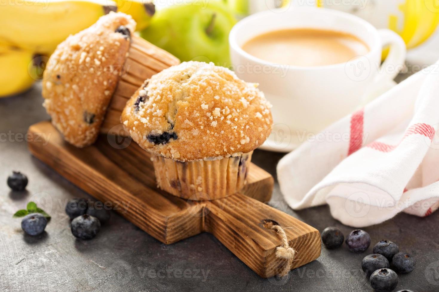 Blueberry and banana muffins with coffee for breakfast photo