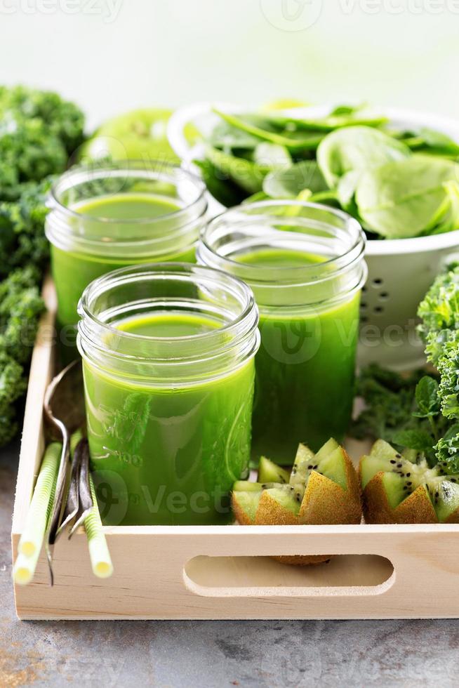 Green juice in mason jars photo