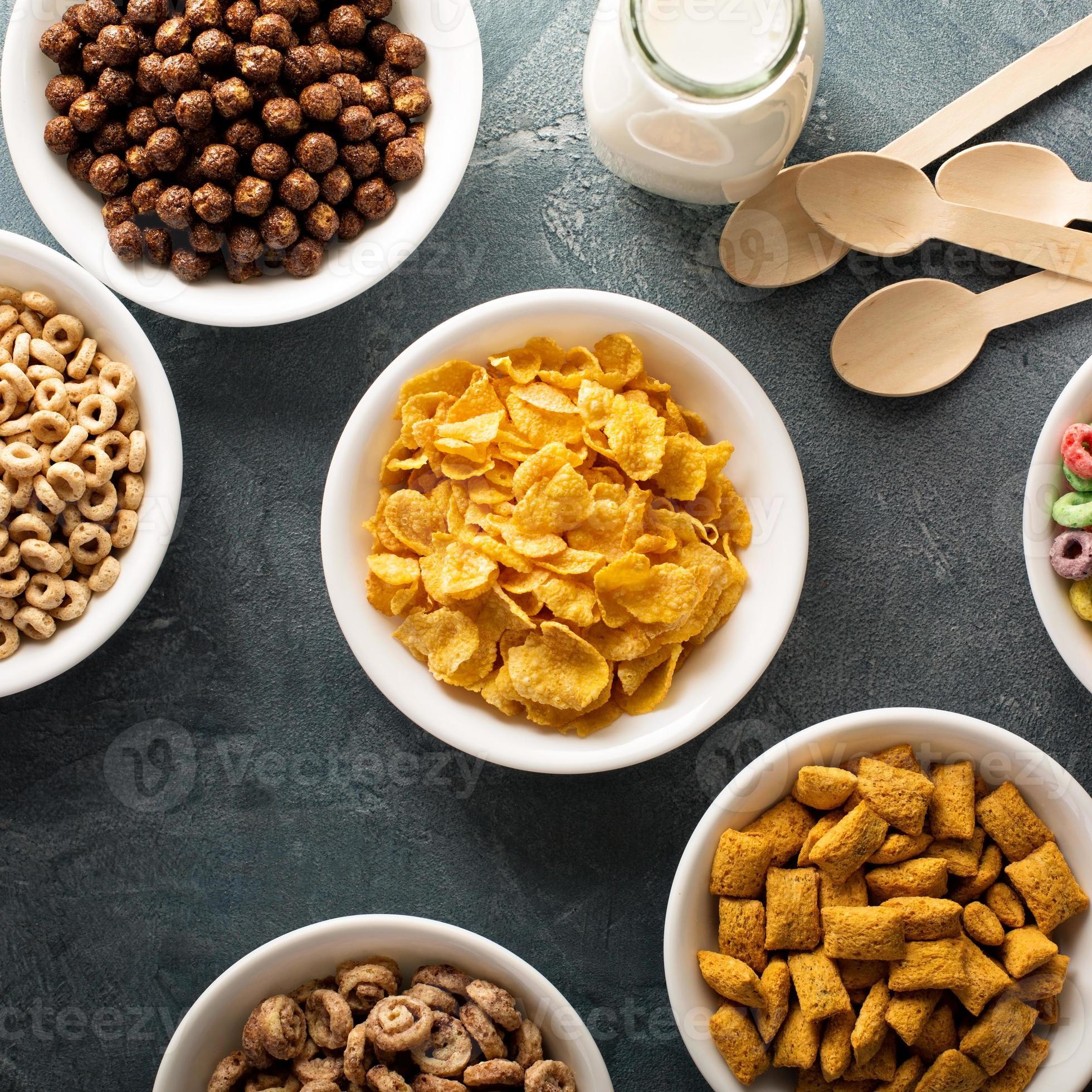 Variety of cold cereals in white bowls 15755035 Stock Photo at Vecteezy