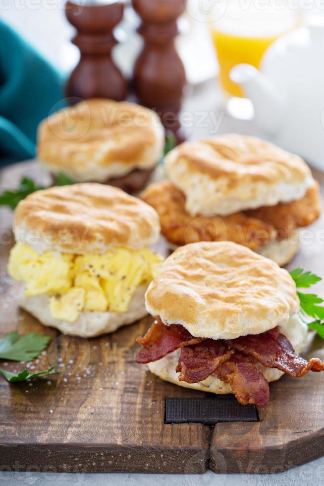 Breakfast biscuits with soft scrambled eggs and bacon photo