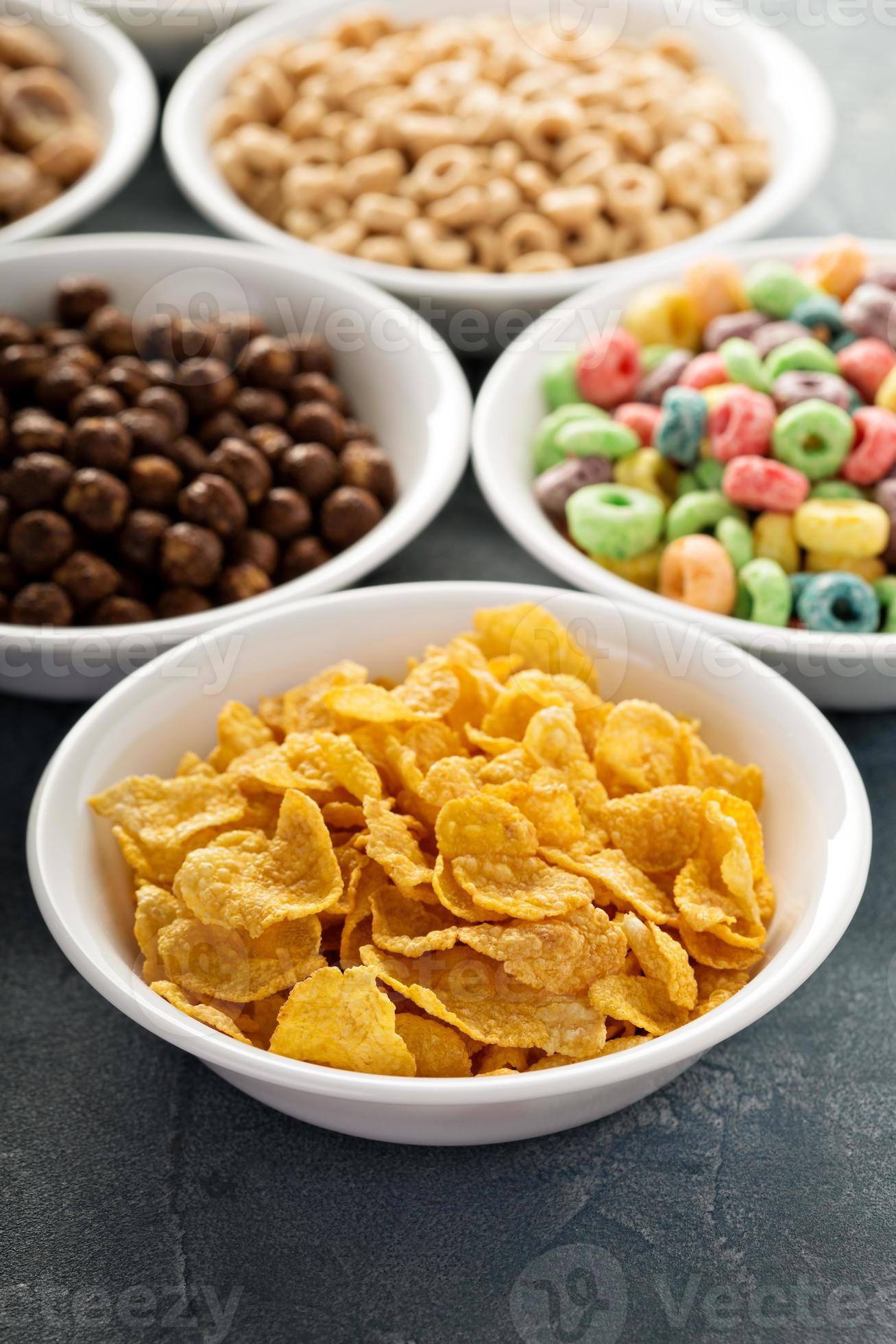 Variety of cold cereals in white bowls 15755862 Stock Photo at Vecteezy