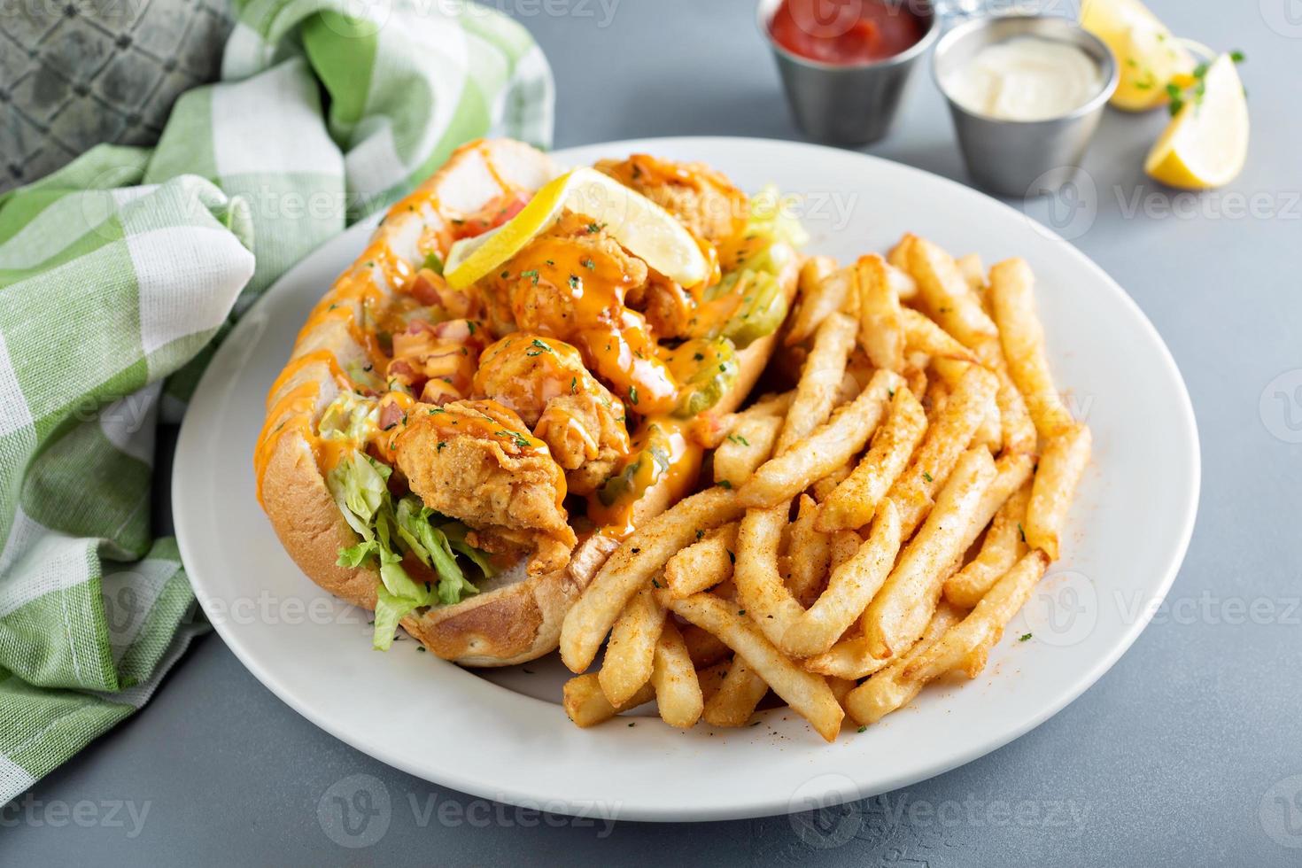 Po boy sandwich with fried shrimp photo