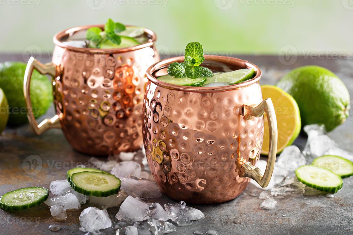Moscow mule cocktail with lime and cucumber photo