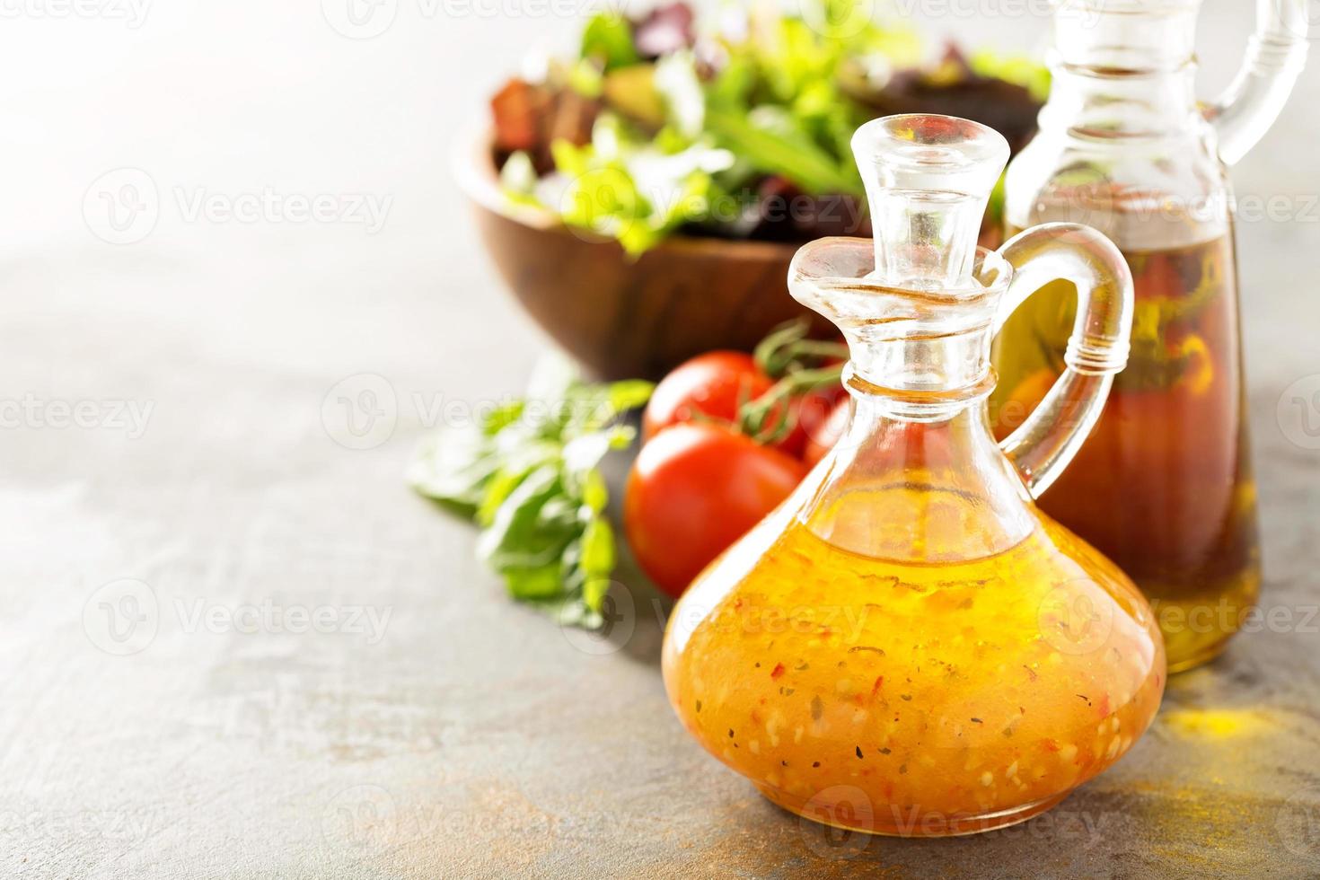 Italian vinaigrette dressing in a vintage bottle photo