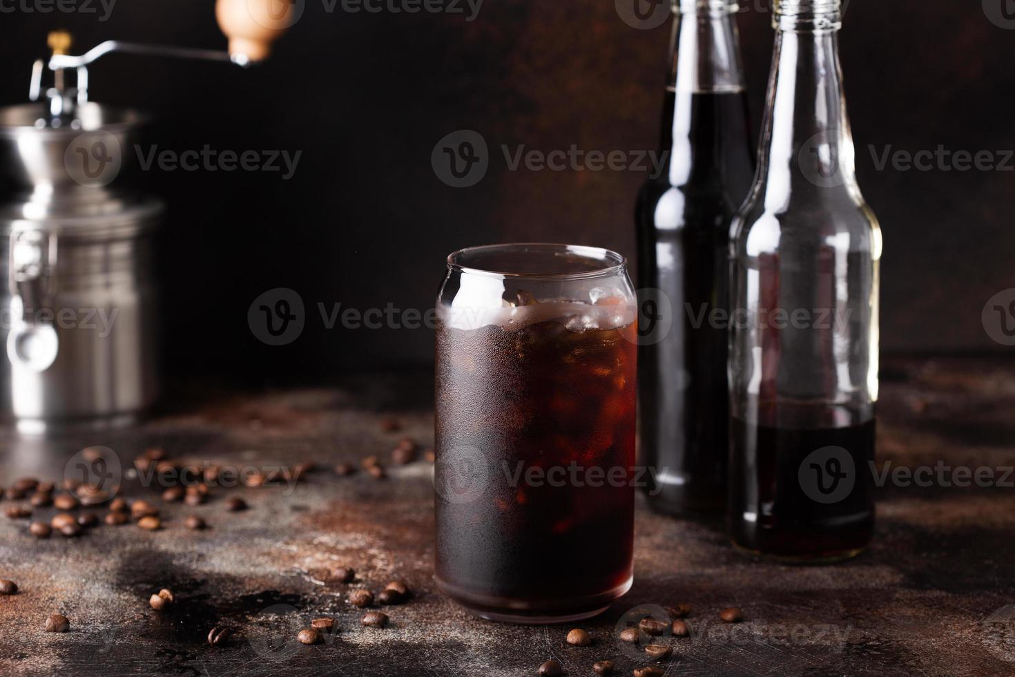 Cold brew iced coffee in glass bottles photo