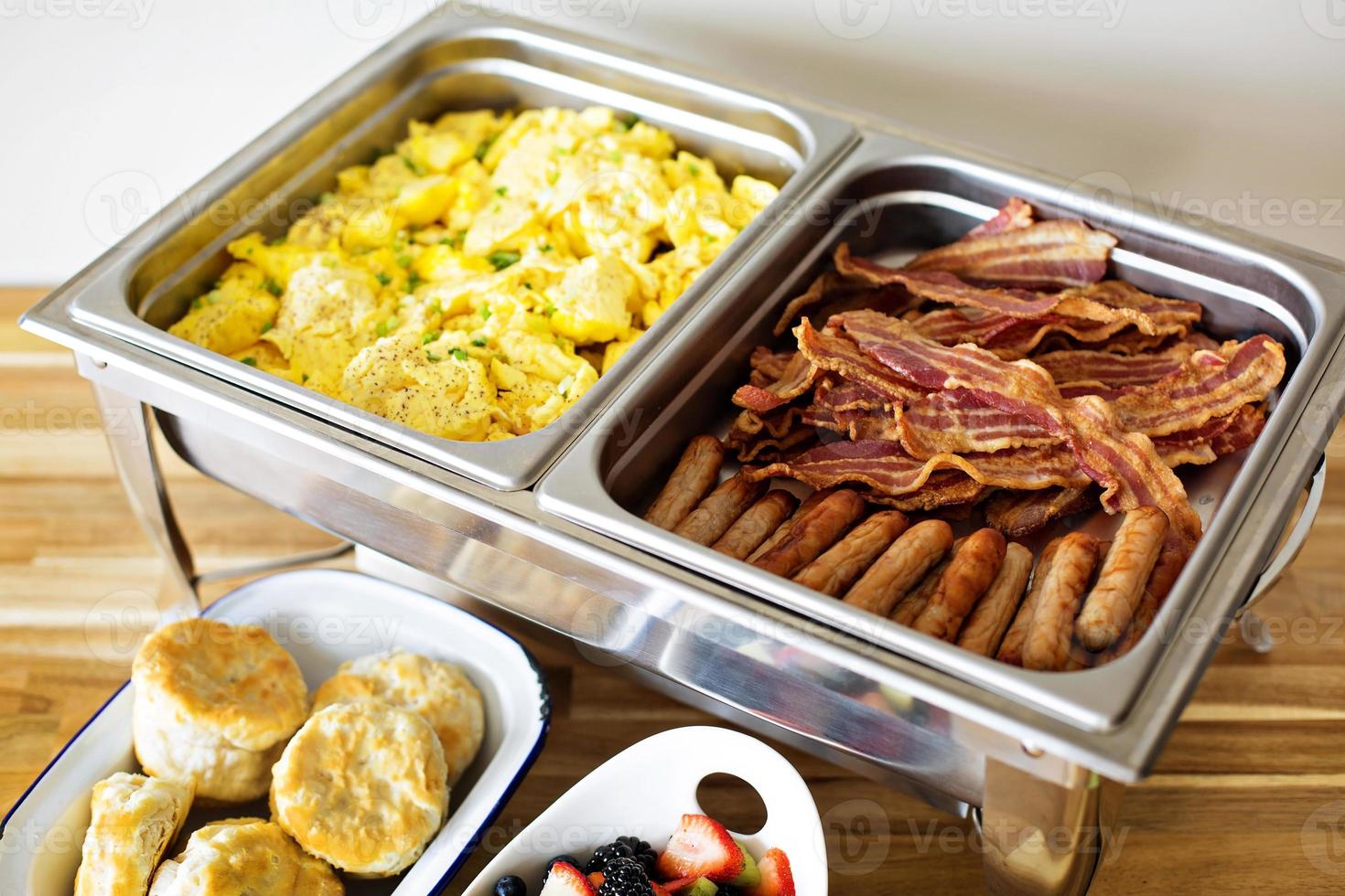 Breakfast buffet with scrambled eggs and bacon photo