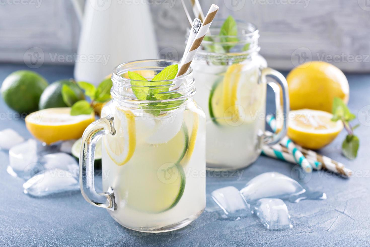 Fresh citrus lemonade in mason jars photo