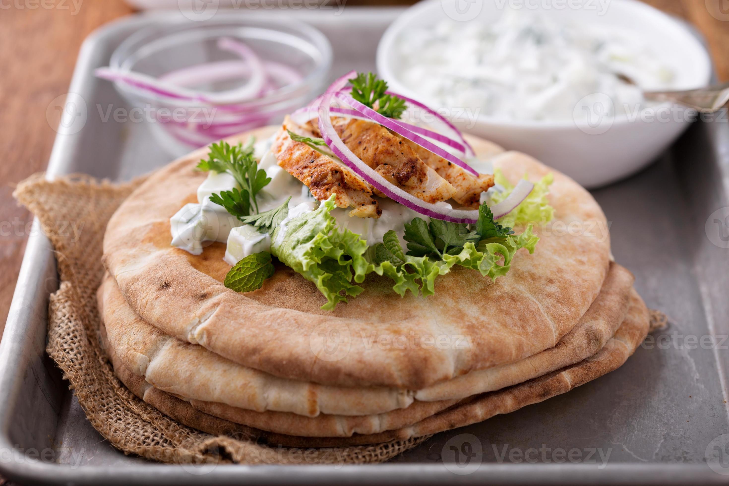 Chicken pita sandwich with cucumber sauce 15758137 Stock Photo at Vecteezy